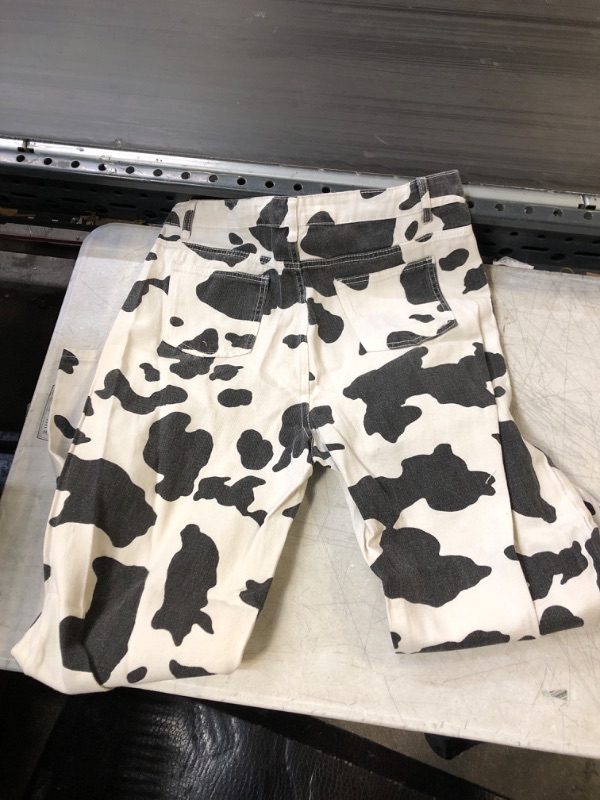 Photo 1 of COW PRINTED JEANS SIZE XL 