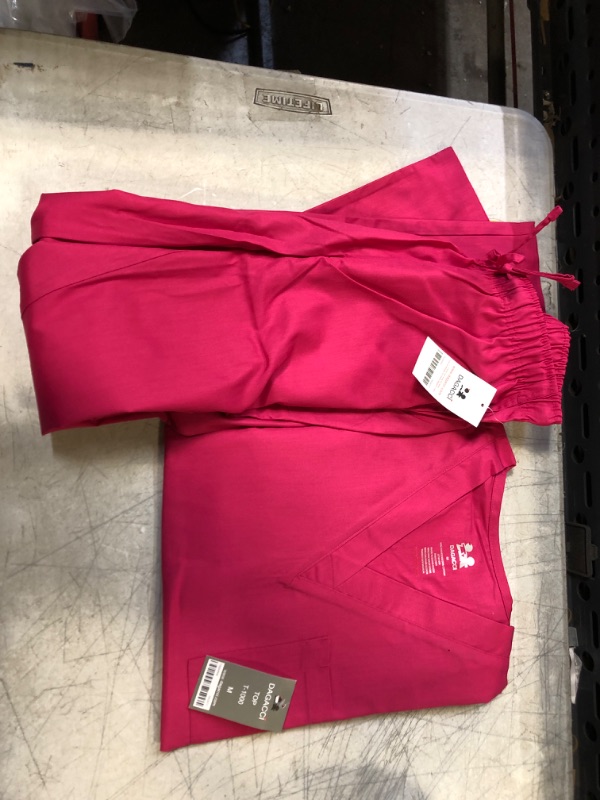 Photo 1 of DAGACCI PINK SCRUBS SIZE M 