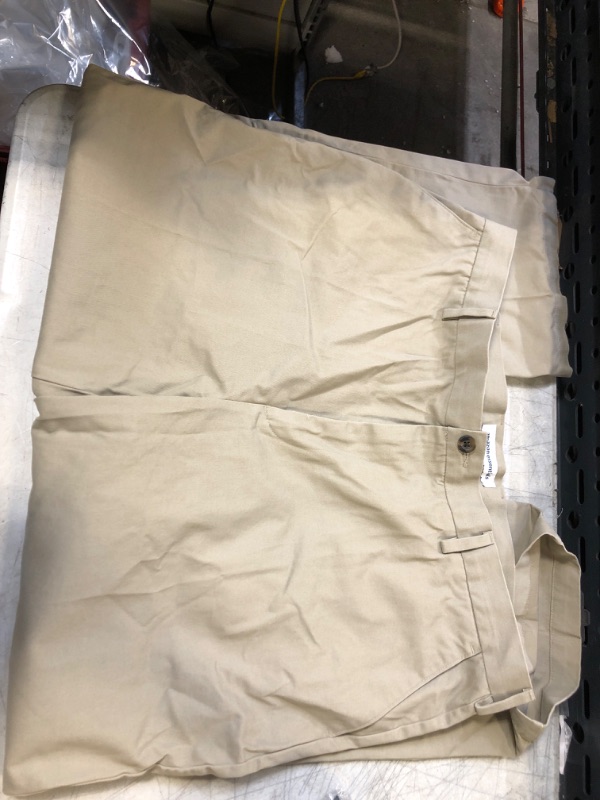 Photo 1 of AMAZON ESSENTIALS KHAKI PANTS 40W X 29L ** SLIGHTLY WORN 