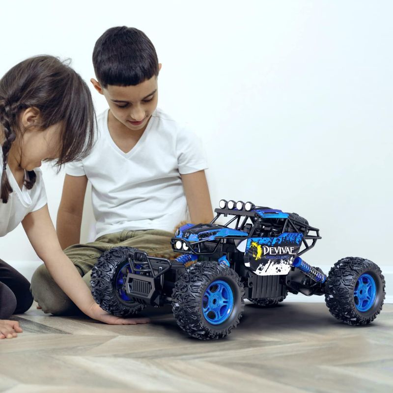 Photo 1 of CROBOLL 1:12 Large Remote Control Car for Boys with Upgraded Lifting Function, 4WD 20km/h RC Car Toys for Kids 4X4 Off-Road RC Rock Crawler, 2.4GHz All Terrain RC Monster Truck for 60Mins Play
