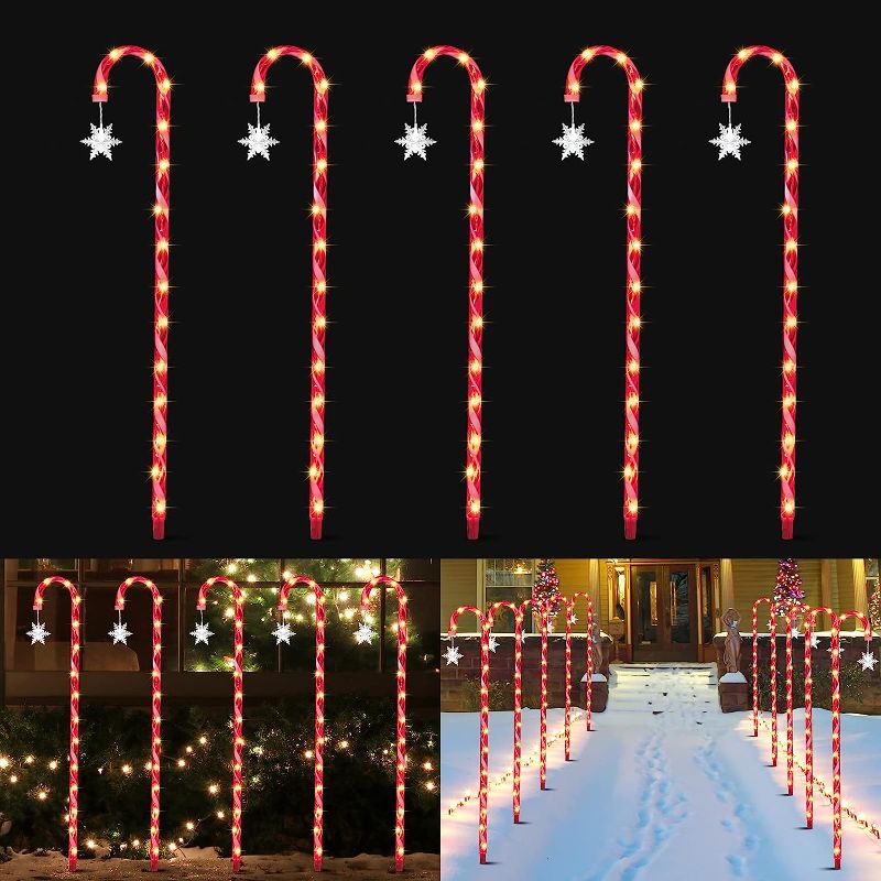 Photo 1 of GLOWNOVA 10 Pack 33inch Twinkle Christmas Candy Cane Lights Candy Cane Pathway Markers Lights with Stake Festive Candy Cane Lights for Christmas Holidays Lighting Sidewalk Yard Decorations…
