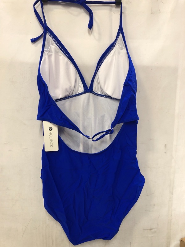 Photo 2 of womens medium royal blue one piece swim suit, open back and synched waist