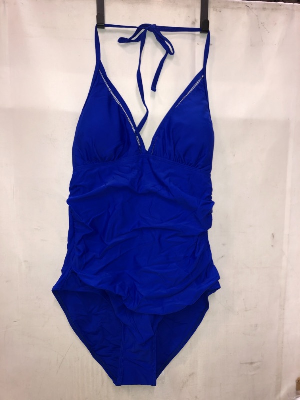 Photo 1 of womens medium royal blue one piece swim suit, open back and synched waist