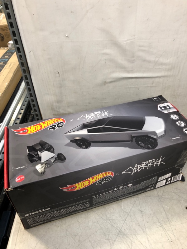 Photo 1 of Hot Wheels RC 1:10 Tesla Cybertruck Radio-Controlled Truck & Electric Cyberquad, Custom Controller, Speeds to 12 MPH, Working Headlights & Taillights, for Kids & Collectors [Amazon Exclusive] (UNABLE TO TEST) (USED) (DIRTY)