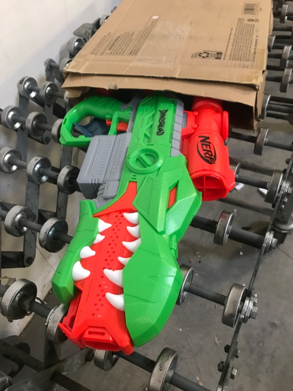 Photo 3 of NERF DinoSquad Rex-Rampage Motorized Dart Blaster, 10-Dart Clip, 20 Official Darts, 10-Dart Storage- T-Rex Dinosaur Design Frustration-Free Packaging