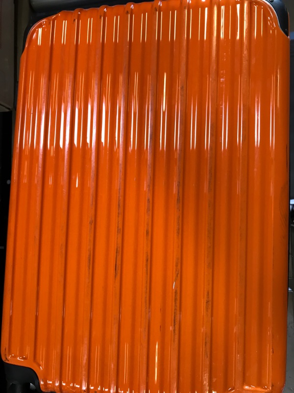 Photo 2 of Amazon Basics 21-Inch Hardside Spinner, Orange
USED. STRATCHES AND OTHER MINOR MARKS ON OUTER CASE. 