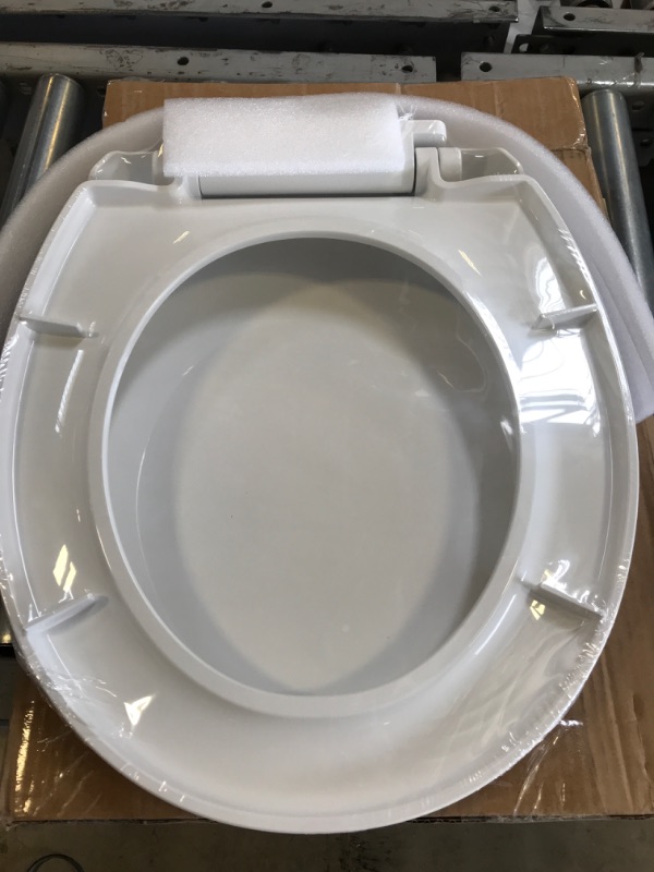 Photo 3 of  ROUND TOILET SEAT  Durable. White
