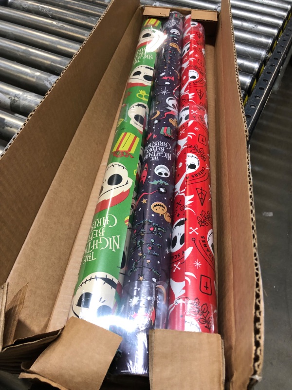 Photo 2 of American Greetings Nightmare Before Christmas Wrapping Paper Bundle with Cut Lines, Jack Skellington and Zero (3 Rolls, 105 sq. ft.)