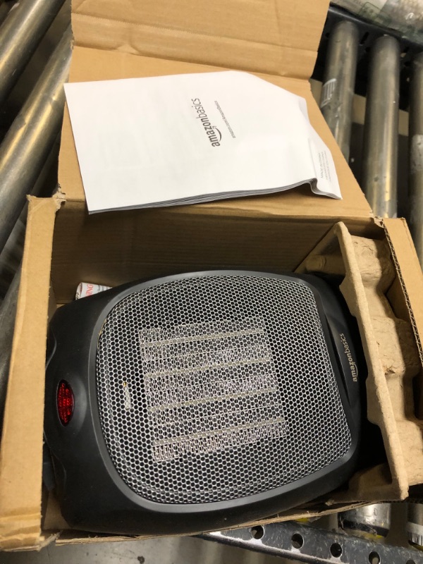 Photo 1 of Amazon Basics 1500W Oscillating Ceramic Heater with Adjustable Thermostat, Black Black Heater with Oscillating