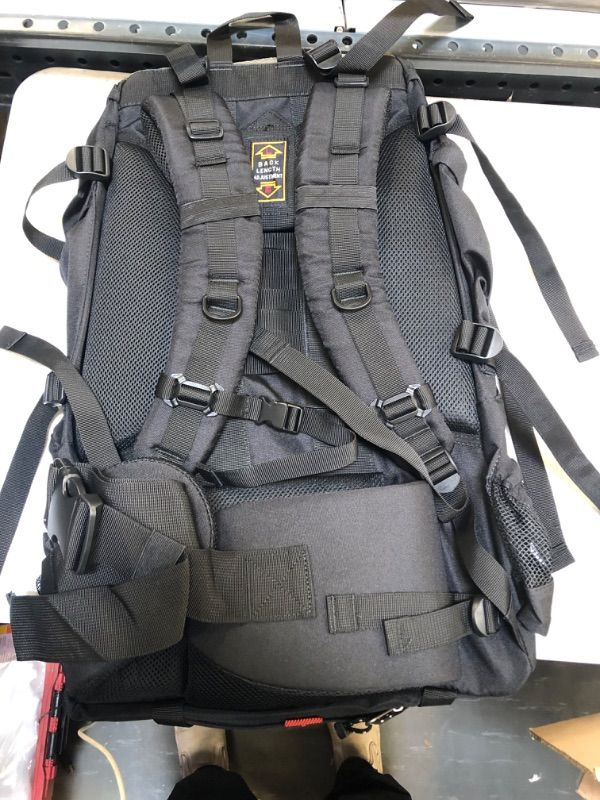 Photo 3 of Amazon Basics Internal Frame Hiking Backpack with Rainfly 65L