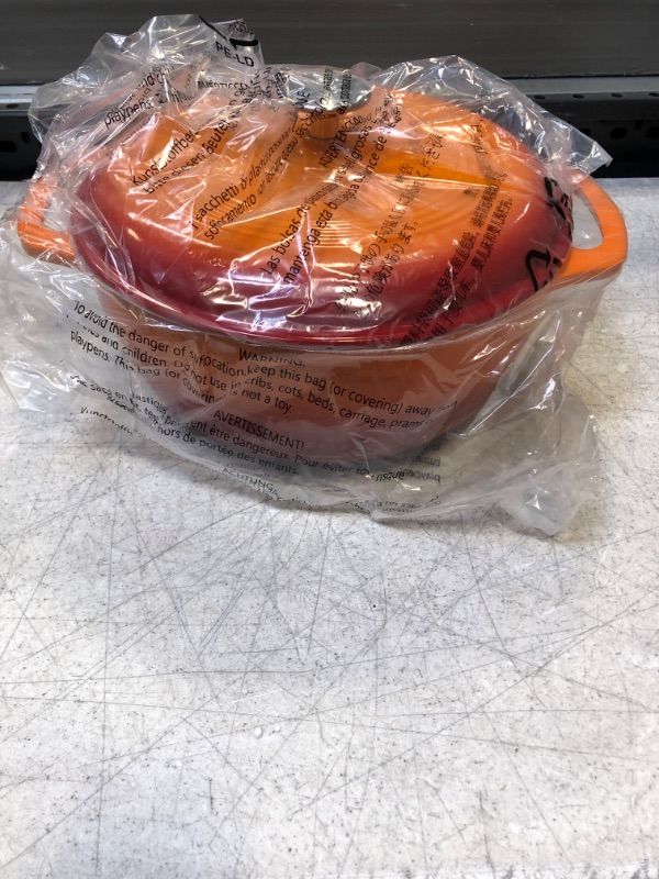 Photo 1 of Amazon Basics Enameled Cast Iron Covered Dutch Oven, 6-Quart, Orange Orange 6-Quart Oven  -- FACTORY SEALED --