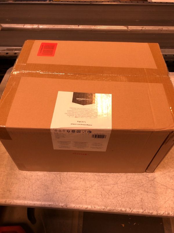 Photo 1 of Amazon Basics Enameled Cast Iron Covered Dutch Oven, 6-Quart, Orange Orange 6-Quart Oven  -- FACTORY SEALED --