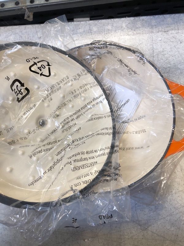 Photo 1 of Amazon Basics Enameled Cast Iron Covered Dutch Oven, 6-Quart, Orange Orange 6-Quart Oven  -- FACTORY SEALED --