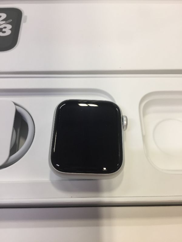 Photo 3 of Apple Watch SE (GPS + Cellular) 40mm Silver Aluminum Case with Abyss Blue Sport Band 