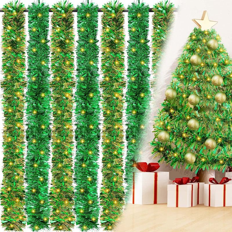 Photo 1 of 157.44 ft Christmas Green Foil Tinsel Garland Metallic Tinsel Twist Garland Green Christmas Tree Topper Decorations with 12 Pcs LED Lights and Other Accessories for Xmas Tree Outdoor Indoor Bedroom