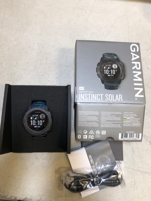 Photo 2 of Garmin Instinct Solar Surf, Rugged Outdoor Smartwatch with Solar Charging Capabilities, Tide Data and Dedicated Surfing Activity, Pipeline ** PLASTIC FILM FROM FACTORY IS STILL ON SCREEN **