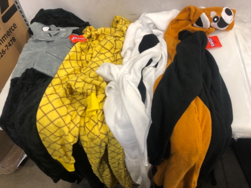 Photo 1 of ASSORTED PAJAMAS/COSPLAY OUTFIT VARIOUS SIZES AND CHARACTERS PACK OF 4 SOLD AS IS