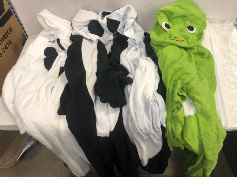 Photo 1 of ASSORTED PAJAMAS/COSPLAY OUTFIT VARIOUS SIZES AND CHARACTERS PACK OF 4 SOLD AS IS