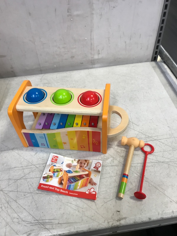 Photo 2 of Hape Pound & Tap Bench with Slide Out Xylophone - Award Winning Durable Wooden Musical Pounding Toy for Toddlers Yellow