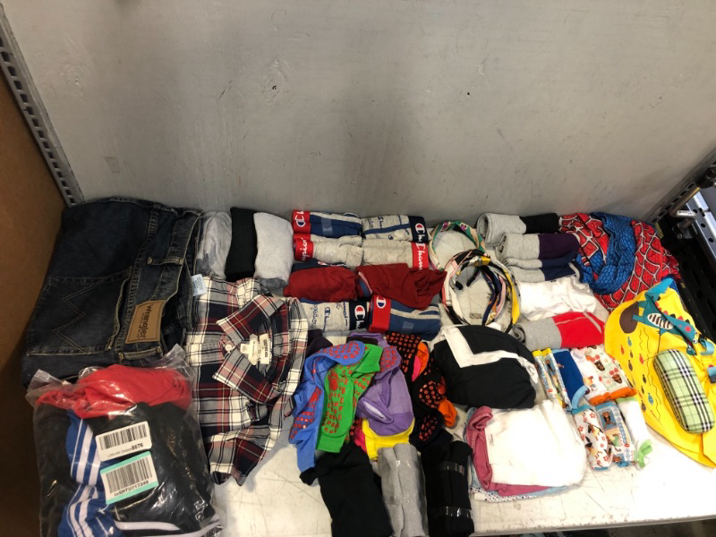 Photo 2 of BOX LOT -- MISC CLOTHING ITEMS SIZES VARY , MENS AND KIDS --