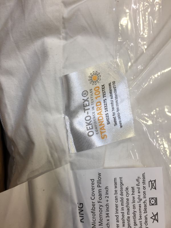 Photo 1 of 2 king pillows with removable pillowcase--pillows are 2 different brands (ore-tex and accuratex)