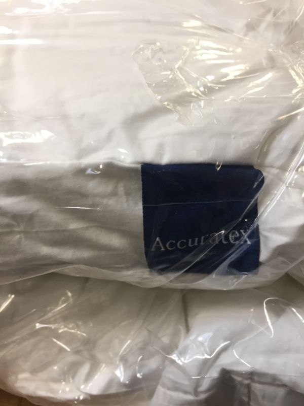 Photo 1 of 2 king pillows with removable pillowcase--pillows are 2 different brands (ore-tex and accuratex)