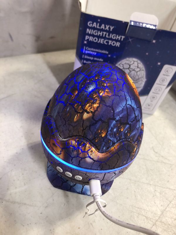 Photo 3 of  Dinosaur Egg Star Projector for Bedroom with Bluetooth Speaker