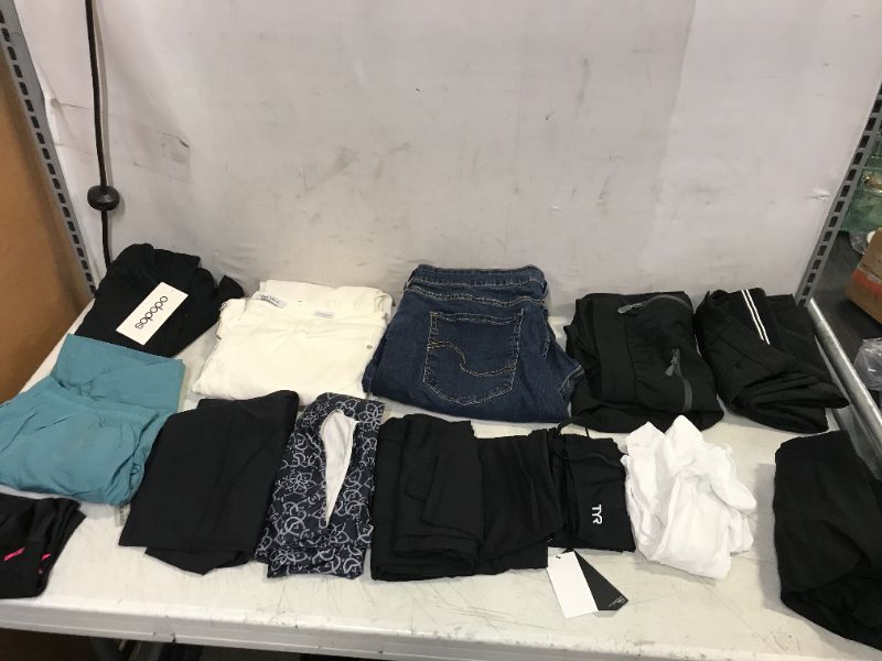 Photo 1 of 13 PCS BAG LOT OF ASSORTED CLOTHING - BOTTOMS/PANTS/SHORTS/SPANDEX - SIZE VARY - NEW/USED
SOLD AS IS