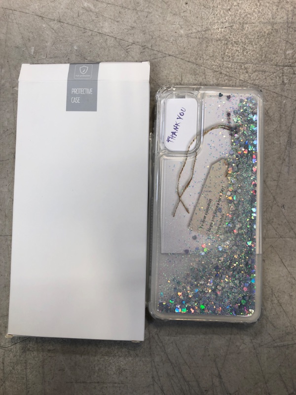 Photo 2 of KSWOUS Glitter Case for Samsung Galaxy A13 5G with 2 Pack Screen Protector, Liquid Quicksand Clear Sparkle Case for Women Girls, Soft TPU Shockproof Protective Cover for Samsung Galaxy A13 5G -Silver