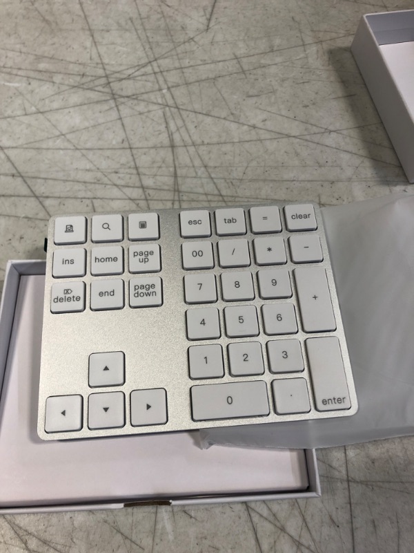 Photo 2 of Bluetooth Numeric Keypad, Rechargeable Aluminum 34-Key Number Pad Slim External Numpad Keyboard Data Entry Compatible for MacBook, MacBook Air/Pro, iMac Windows Laptop Surface Pro etc A-Silver