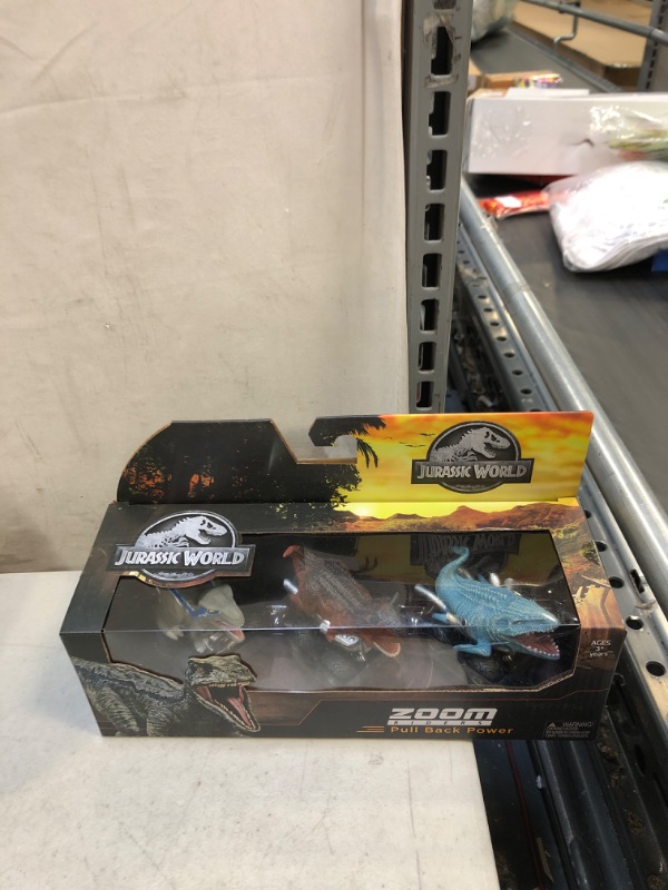 Photo 2 of Jurassic World Zoom Riders Pull Back Vehicle Power Clash Edition Toy – 3 Car Pack (Vehicle Types May Vary)
