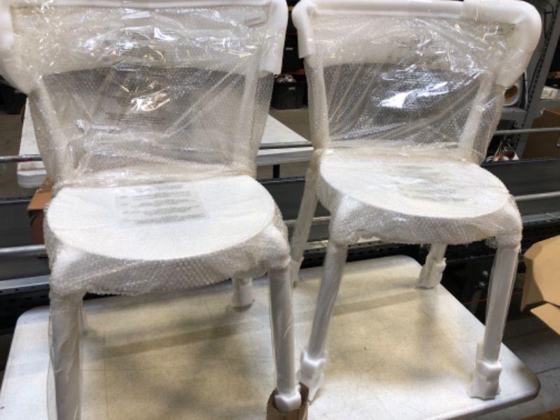 Photo 4 of Amazon Basics White, Armless Bistro Dining Chair-Set of 2, Premium Plastic White Dining Chair -- FACTORY SEALED --