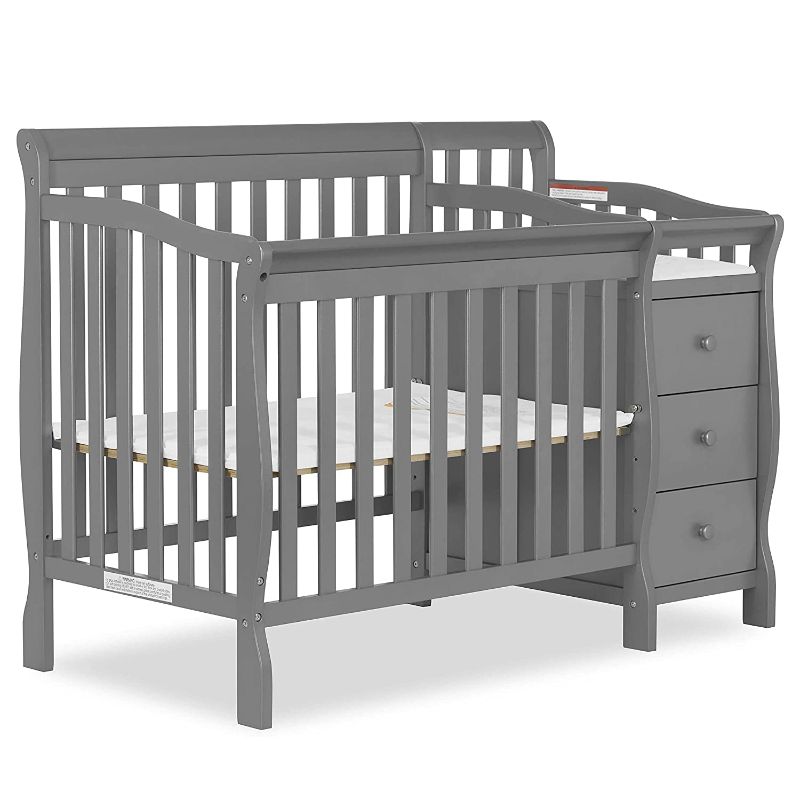 Photo 1 of Dream On Me Jayden 4-in-1 Mini Convertible Crib And Changer in Storm Grey, Greenguard Gold Certified, Non-Toxic Finish, New Zealand Pinewood, 1" Mattress Pad
