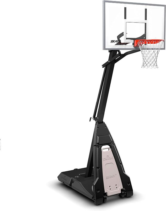 Photo 1 of (COMES WITH 4 BOXES, 2 OF THE BOXES ARE OPENED AND MISSING PARTS)Spalding The Beast® Portable Basketball Hoop
