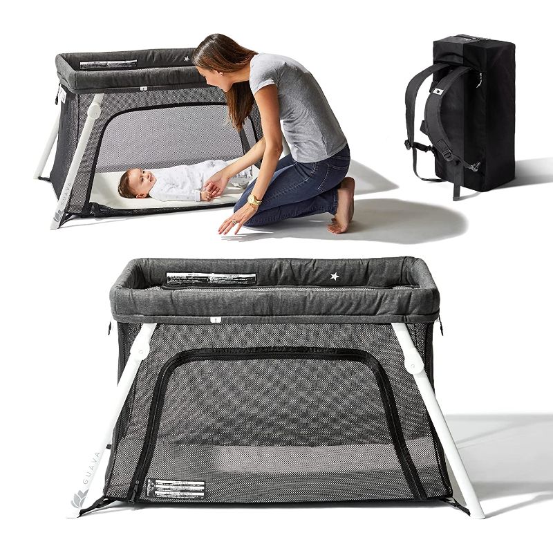 Photo 1 of Lotus Travel Crib - Backpack Portable, Lightweight, Easy to Pack Play-Yard with Comfortable Mattress - Certified Baby Safe
