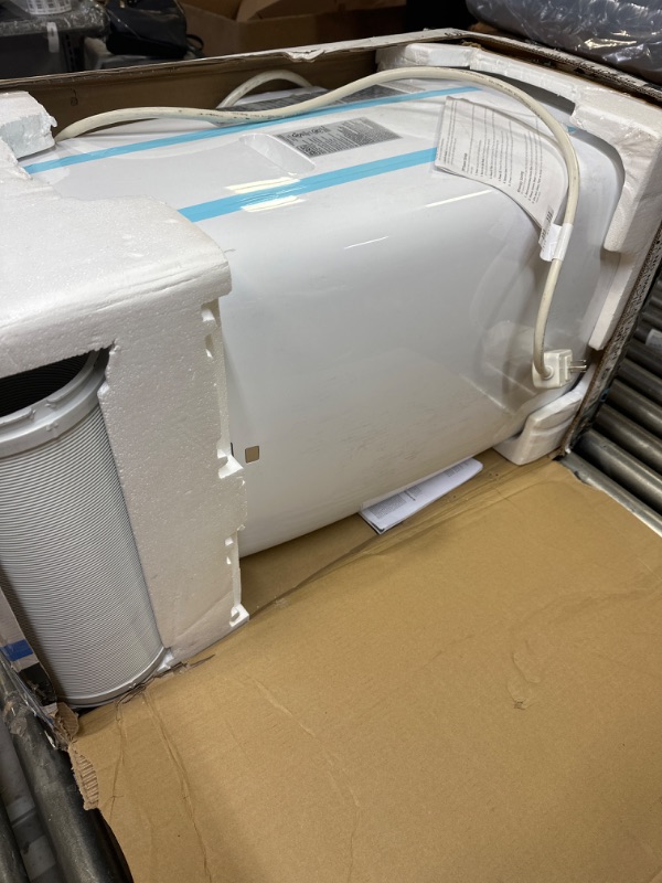 Photo 2 of BLACK+DECKER 14,000 BTU Portable Air Conditioner with Heat, White White 14,000 BTU + HEAT -- item has scuffs on the front side due to usage --- needs cleaning due to dirt around the item 