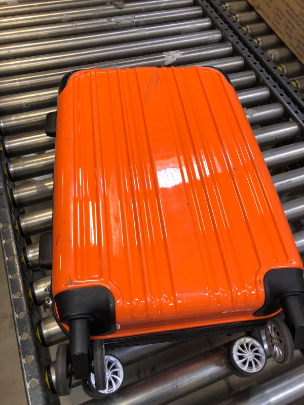 Photo 1 of 20 INCH ORANGE SUITCASE 
USED - DIRTY
