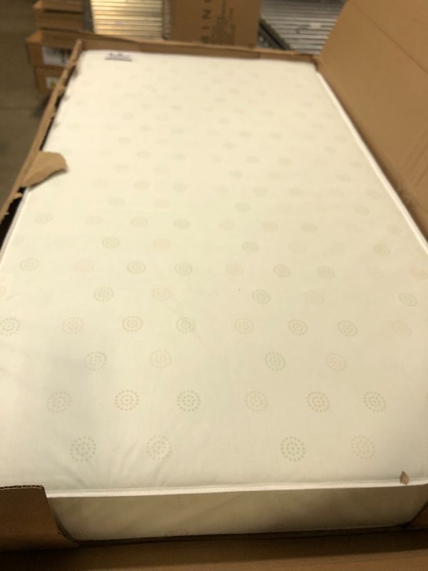 Photo 2 of Delta Children Twinkle Galaxy Dual Sided Crib and Toddler Mattress - Premium Sustainably Sourced Fiber Core - Waterproof - GREENGUARD Gold Certified (Non-Toxic) - 7 Year Warranty - Made in USA