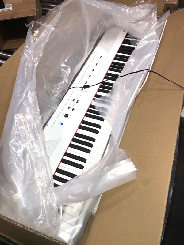 Photo 2 of Alesis Recital – 88 Key Digital Piano Keyboard with Semi Weighted Keys, 2x20W Speakers, 5 Voices, Split, Layer and Lesson Mode, FX and Piano Lessons
