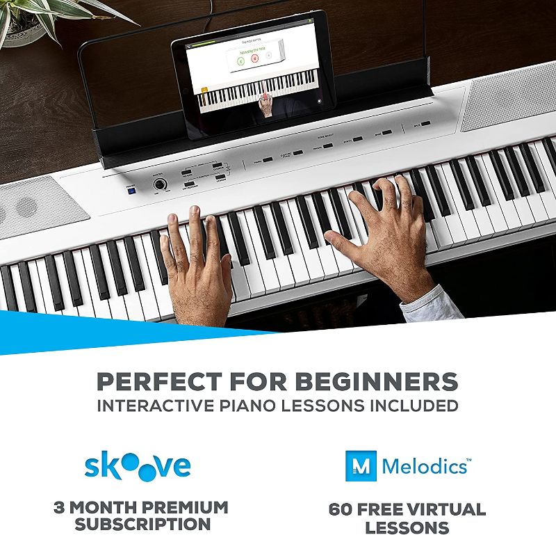 Photo 1 of Alesis Recital – 88 Key Digital Piano Keyboard with Semi Weighted Keys, 2x20W Speakers, 5 Voices, Split, Layer and Lesson Mode, FX and Piano Lessons
