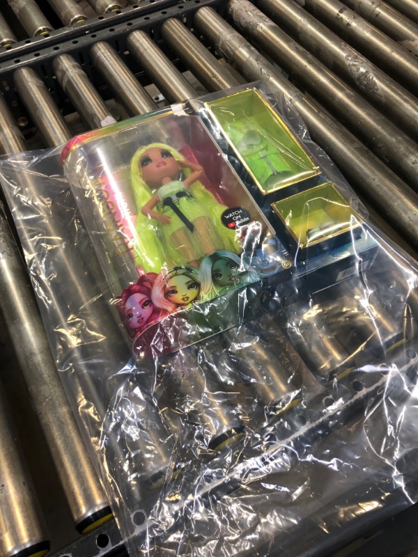 Photo 2 of Rainbow High Karma Nichols – Neon Green Fashion Doll with 2 Outfits to Mix & Match and Doll Accessories, Great Gift for Kids 6-12 Years Old ------ FACTORY SEALED