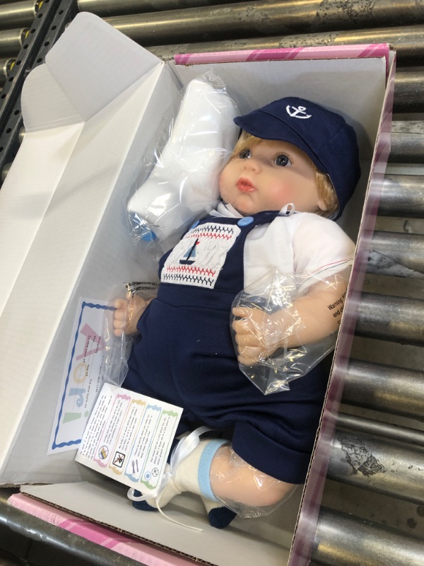 Photo 2 of Aori Reborn Baby Dolls 22 Inch Realistic Newborn Baby Boys Lifelike Weighted Reborn Dolls Cool Princekin with Blue Suspender Suit and Wooden Toys Great Birthday Set for Boys Age 3+ Handsome Prince