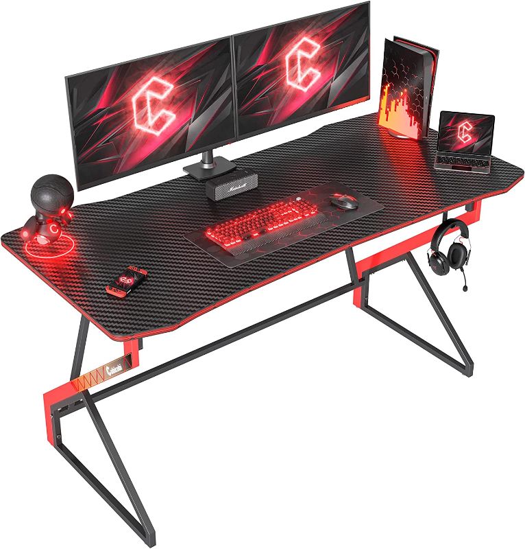 Photo 1 of CubiCubi Simple Gaming Desk Z Shaped 55 inch Gamer Workstation, Home Computer Carbon Fiber Surface Gaming Desk PC Table with Headphone Hook ----- OUT OF THE BOX NEW