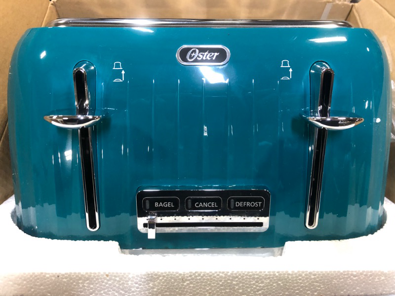 Photo 3 of Oster 4-Slice Extra Wide Slot Pop Up Toaster with 9 Shade Settings, Removable Crumb Tray, and Quick Check Lever, Teal w/ Chrome Accents