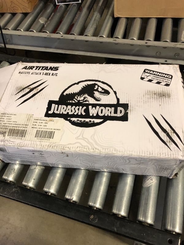 Photo 1 of AIRTITANS Jurassic World Inflatable T Rex RC – Massive Attack Air Titans Dinosaur - Over 6 Feet Long - Turns & Spins - Stomps & Roars!
