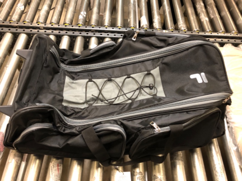 Photo 1 of Fila 32 Inch Rolling Duffel Bag
+++BAG LEG BROKEN++++