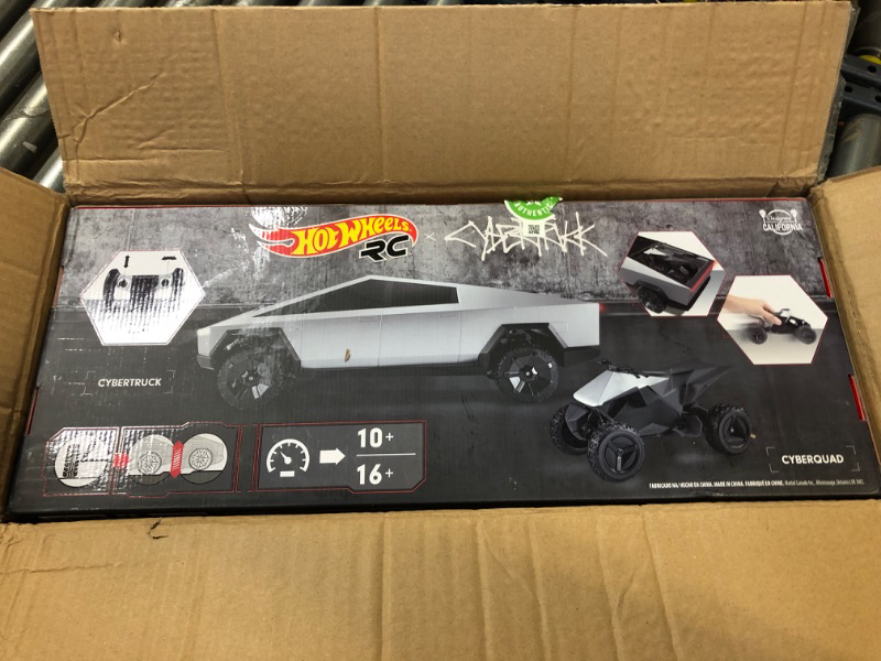 Photo 3 of Hot Wheels RC 1:10 Tesla Cybertruck Radio-Controlled Truck & Electric Cyberquad, Custom Controller, Speeds to 12 MPH, Working Headlights & Taillights, for Kids & Collectors [Amazon Exclusive]