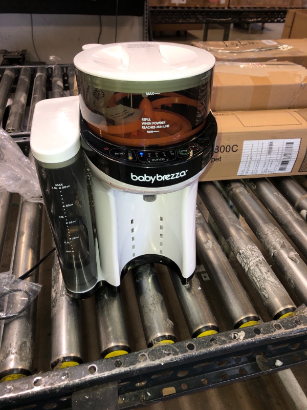 Photo 1 of New and Improved Baby Brezza Formula Pro Advanced Formula Dispenser Machine - Automatically Mix a Warm Formula Bottle Instantly - Easily Make Bottle with Automatic Powder Blending