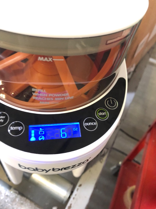Photo 2 of New and Improved Baby Brezza Formula Pro Advanced Formula Dispenser Machine - Automatically Mix a Warm Formula Bottle Instantly - Easily Make Bottle with Automatic Powder Blending---MINOR USED 
