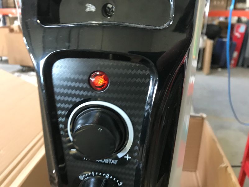 Photo 3 of Amazon Basics Indoor Portable Radiator Heater - White
